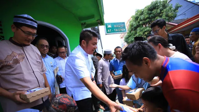 Safari Jumat Herman Deru Jadi Simbol Kerukunan di Tengah Keberagaman Sumsel - GenPI.co