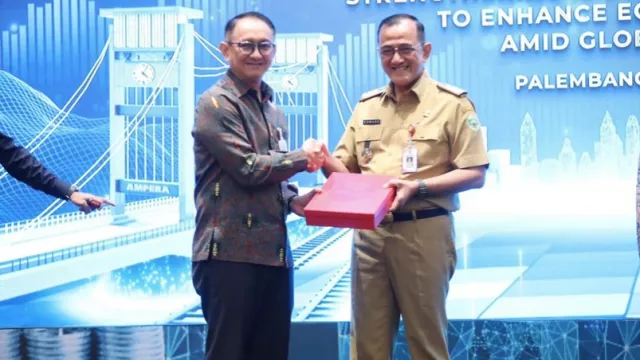 Pertumbuhan Ekonomi Sumsel Moncer, Sekda Edward Candra Terus Dorong Investasi - GenPI.co