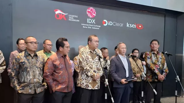 Dirut BEI Mundur, OJK Pastikan Pasar Modal Tetap Aman - GenPI.co