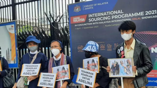 Mencari Keadilan untuk TKI Adelina Lisao yang Disiksa di Malaysia - GenPI.co