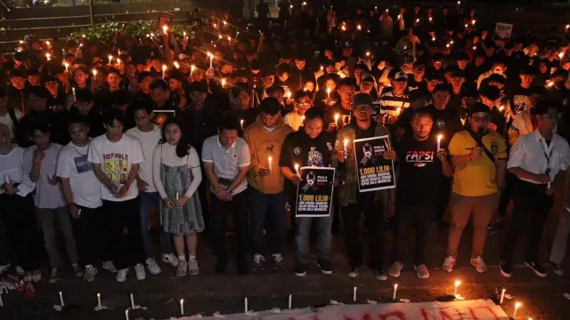 Aksi 1.000 Lilin Bukti Apresiasi Perjuangan Erick Thohir dari Sanksi FIFA - GenPI.co