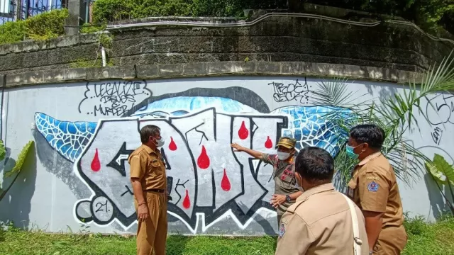 Mural Tukad Badung Bali Kena Vandalisme, Sekda Denpasar Buru Ini - GenPI.co BALI