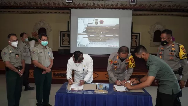 Polresta dan BPBD Denpasar Bali Teken MoU Soal Bencana, Isinya? - GenPI.co BALI