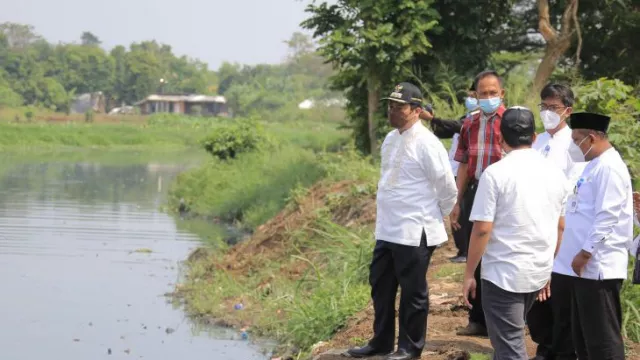 Bosan Kena Banjir, Pemkot Tangerang Normalisasi 8 Sungai - GenPI.co BANTEN