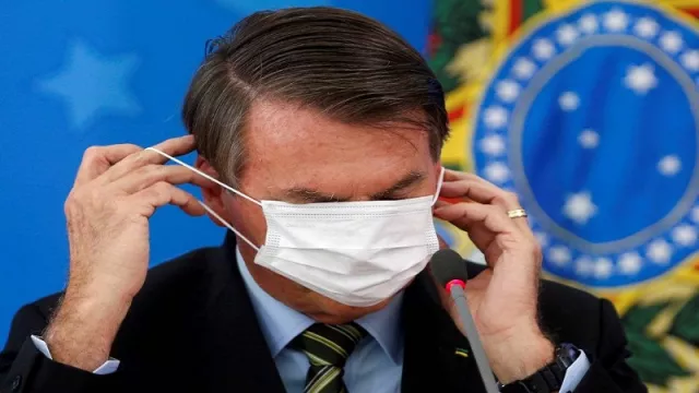 Presiden Brasil Nekat Lepas Masker Baru Sembuh Covid-19 - GenPI.co