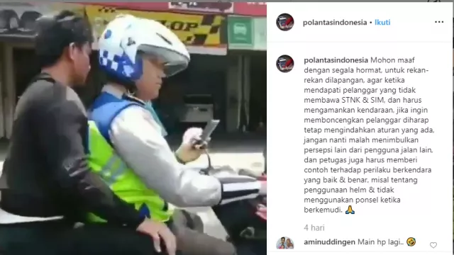 Polisi ini Terciduk Bonceng Orang Tanpa Helm, Sambil Main HP Pula - GenPI.co