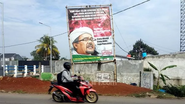 TNI Copot Baliho Habib Rizieq, FPI: Pangdam Sebaiknya Urus OPM - GenPI.co