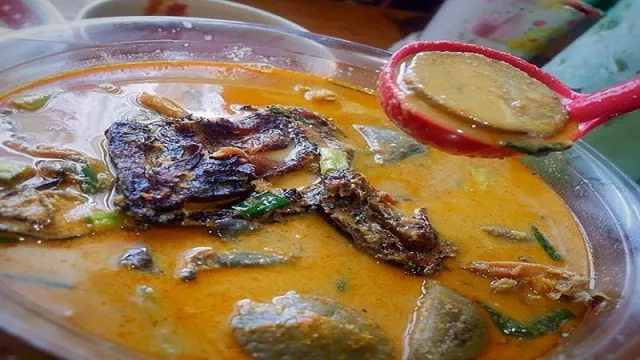 Sensasi Ikan Asap dalam Gulai Taboh - GenPI.co