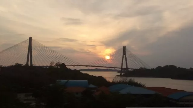 Indahnya Pemandangan Jembatan Raja Haji Fisabilillah di Batam - GenPI.co Indahnya Pemandangan Jembatan Raja Haji Fisabilillah di Batam - GenPI.co