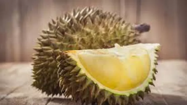 3 Cara Cepat Usir Bau Mulut Setelah Makan Durian - GenPI.co