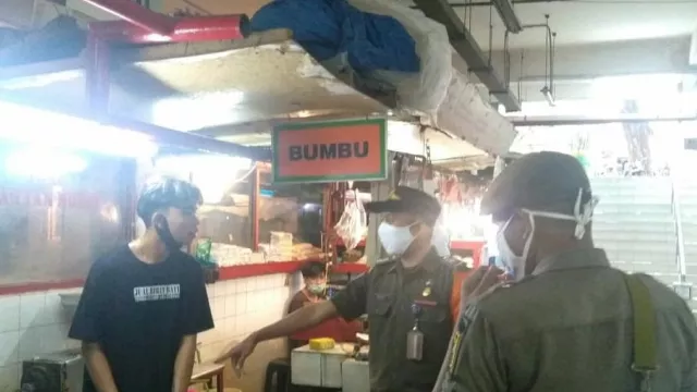 21 Pelanggar ProkesTerjaring Operasi Tibmask di Jakarta - GenPI.co