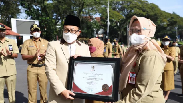 2 OPD Pemkot Malang Diganjar Penghargaan - GenPI.co JATIM