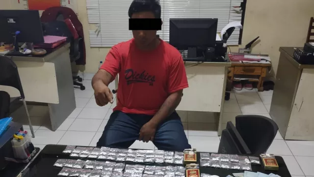 Tertangkap Basah, Pria di Malang Tak Berkutik Saat Polisi Tiba - GenPI.co JATIM