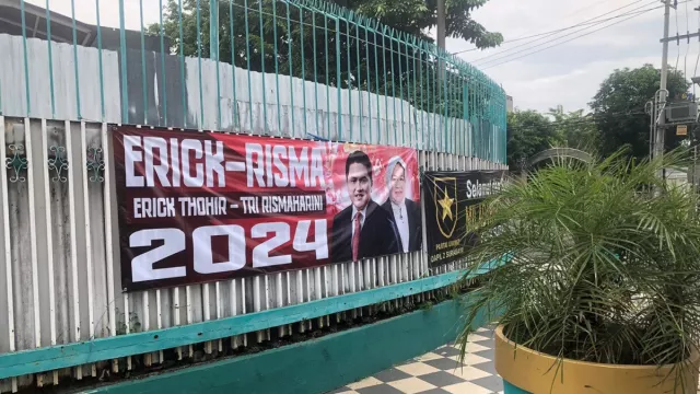Banner Erick Thohir Bersama Tri Rismaharini Muncul di Surabaya - GenPI.co JATIM