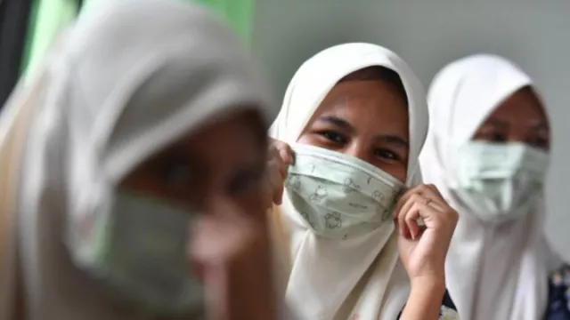 Epidemiolog UGM Sebut Pelonggaran Masker untuk Saat Ini Tepat - GenPI.co JOGJA