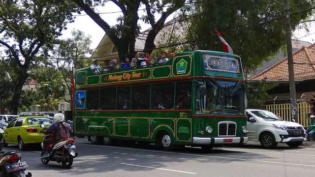 Wisatawan Keliling Kota Malang Gratis Naik Bus Macito - GenPI.co
